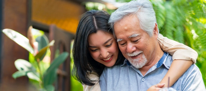 father and daughter happy senior is using check-in service