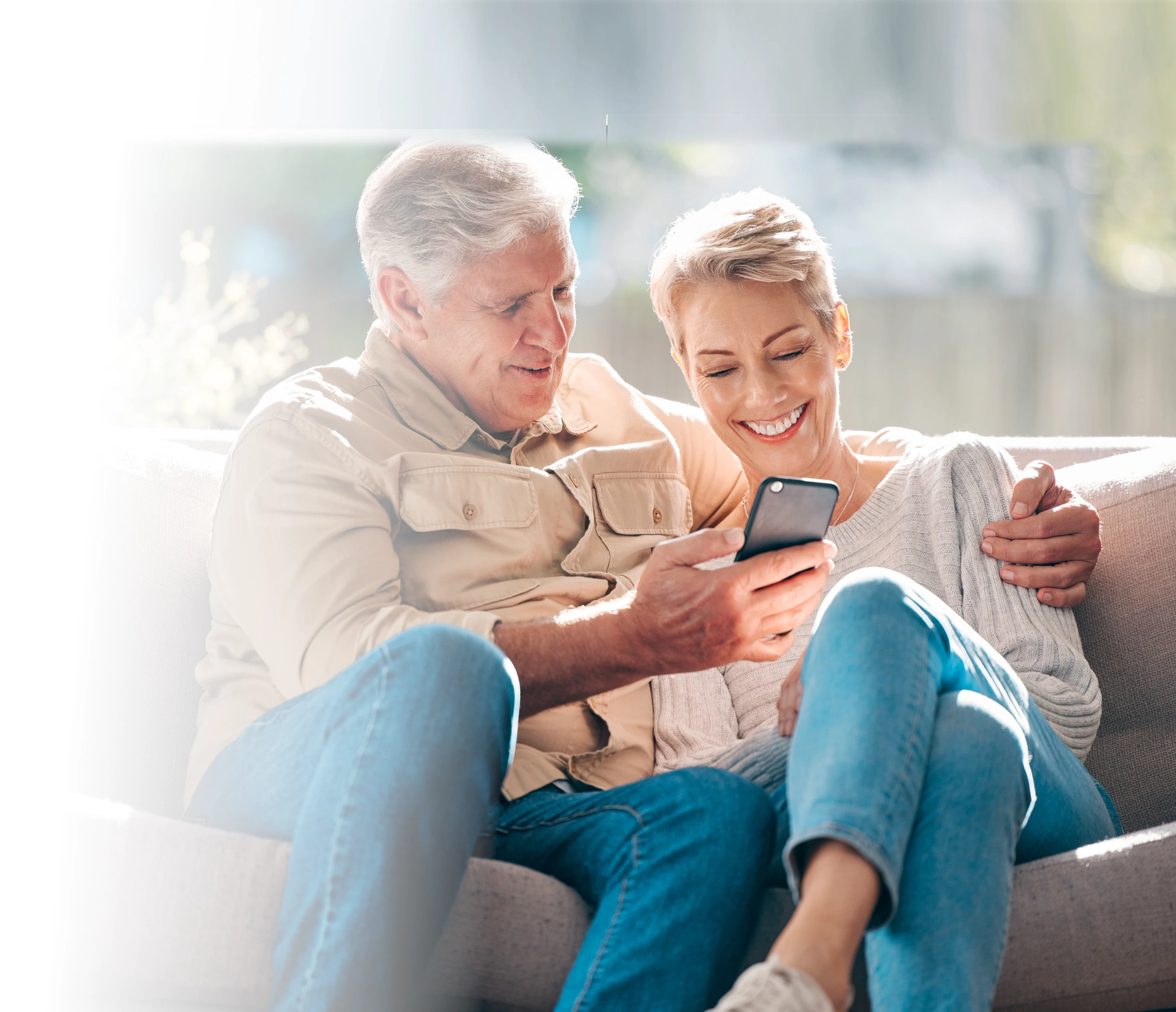 senior showing daughter how easy it is to check-in with the WellCheck Now check-in service